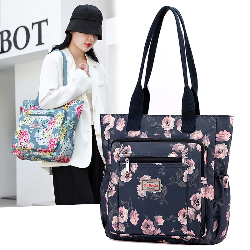 新款大容量防水牛津布女包手提单肩休闲出行旅游时尚印花通勤托特