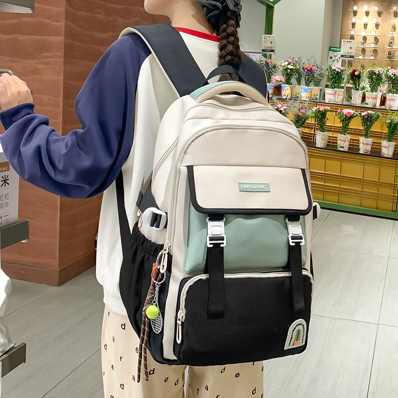 初中生书包女大容量韩版高中生大学生休闲百搭减负背包旅行双肩包