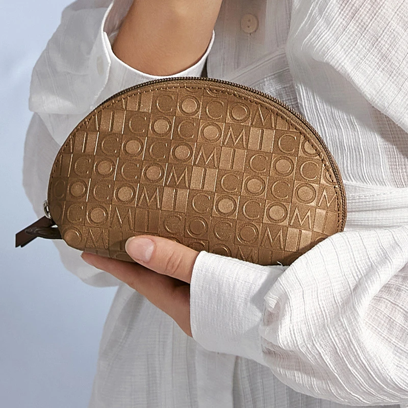 COMICO/高美高压花女包包包出差旅行女士收纳包便携手拿包CD397