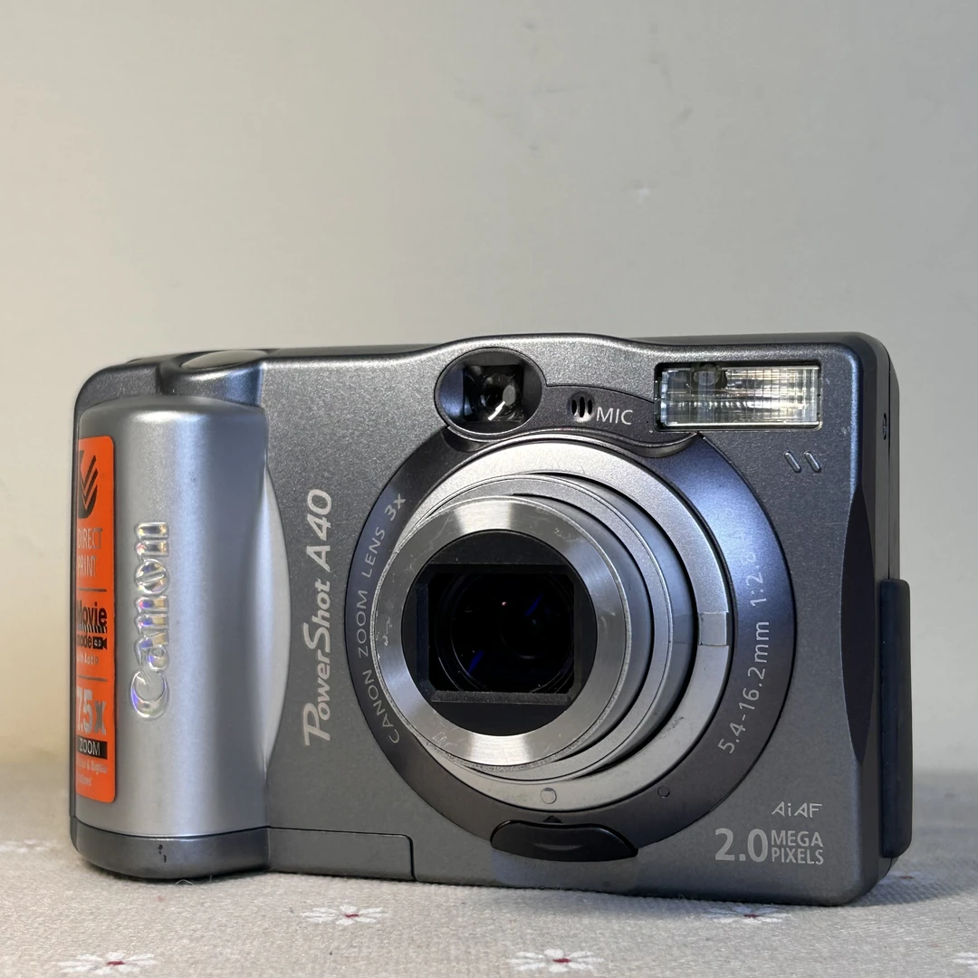 9新 Canon/佳能 a40 银色照相 冷白皮 用cf卡 需要四节五号电池