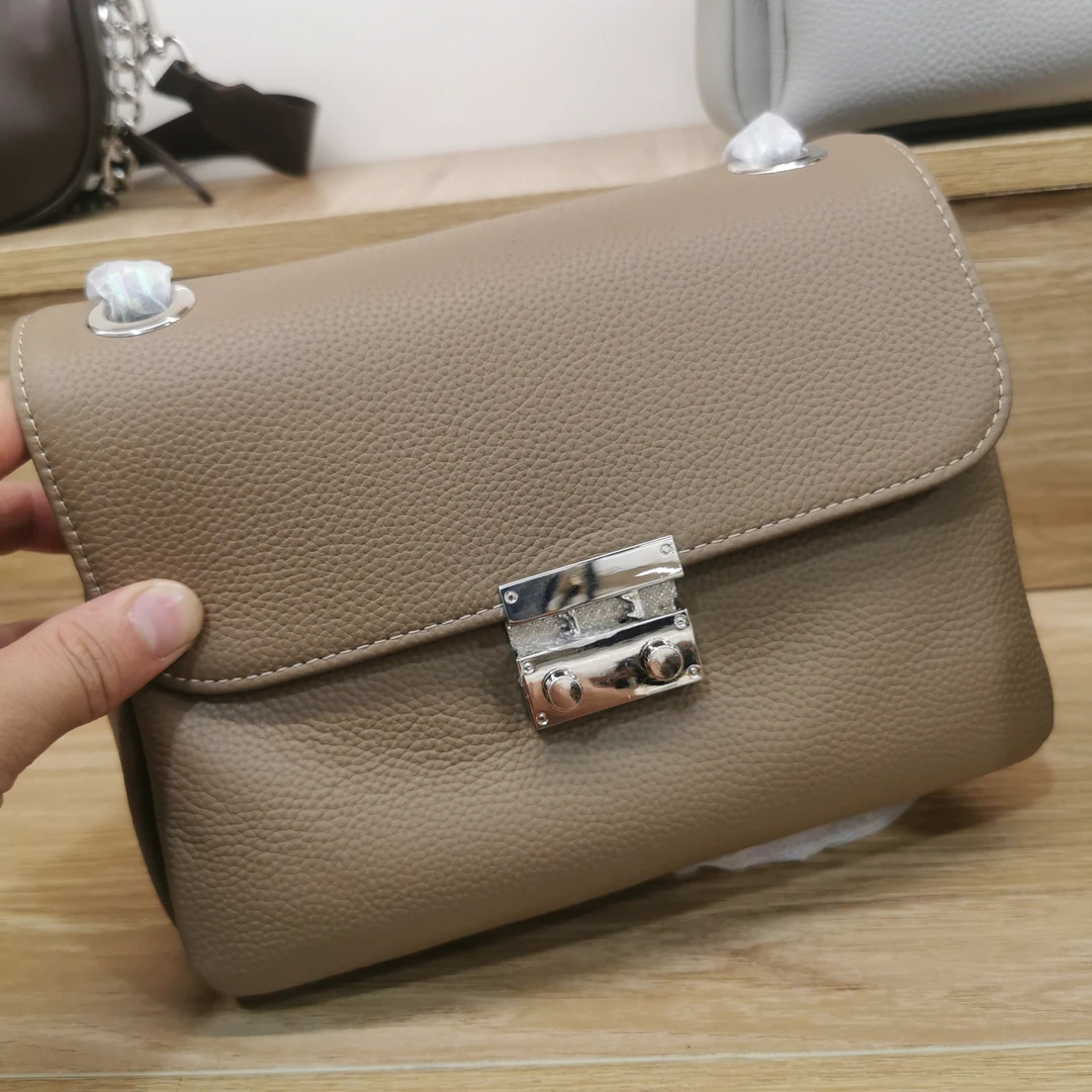 头牛彩链条锁扣多隔层精品斜挎包单肩包底宽23高17厚8CM