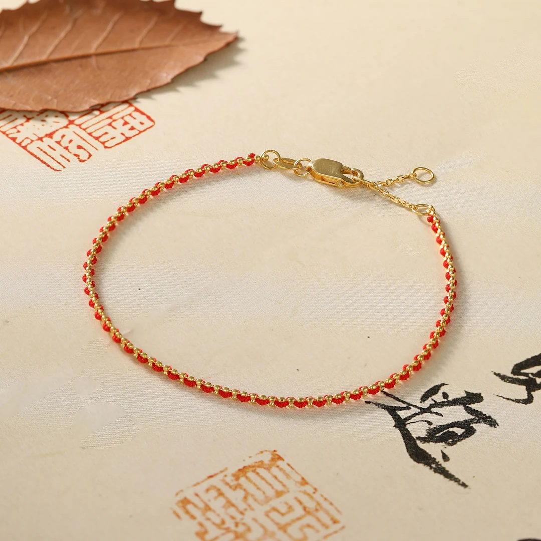 【嘉一珠宝】18k金幸运红绳手链原创手工编织款手饰时尚百搭AD8473