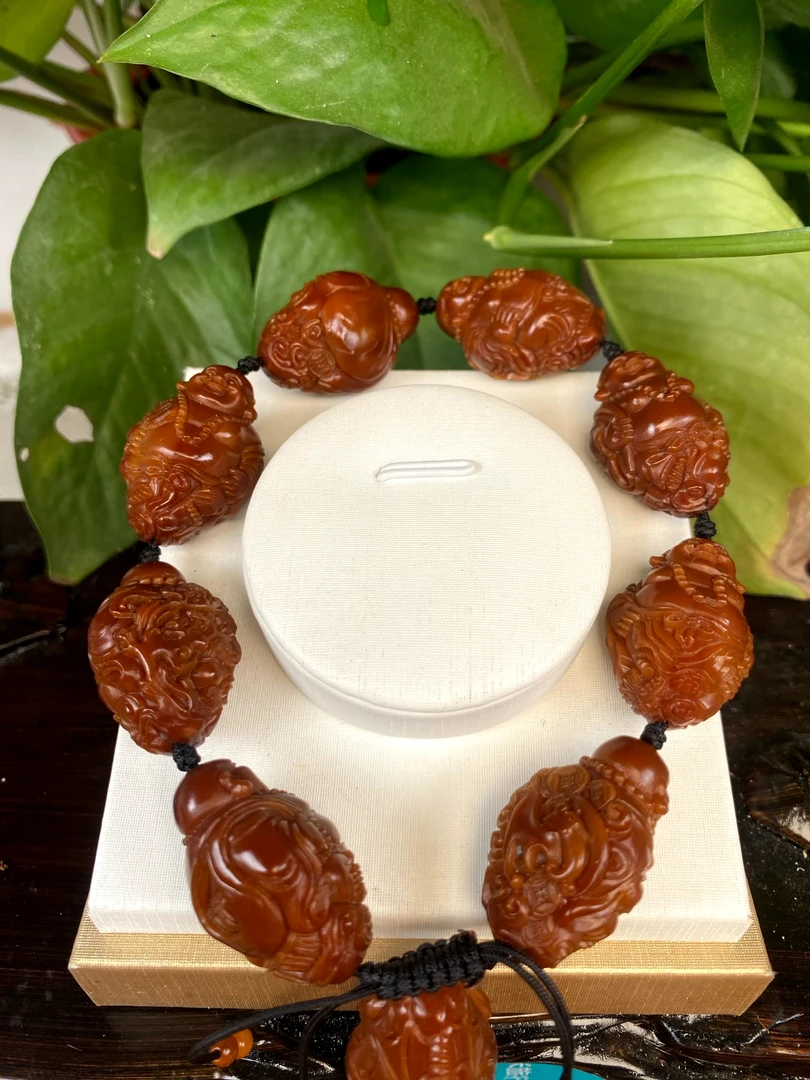 藏越，包浆料弥勒橄榄核雕手串3