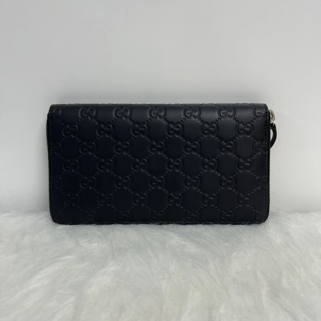 95新 GUCCI/古驰 97新黑色压花钱包/11518男士压纹长款