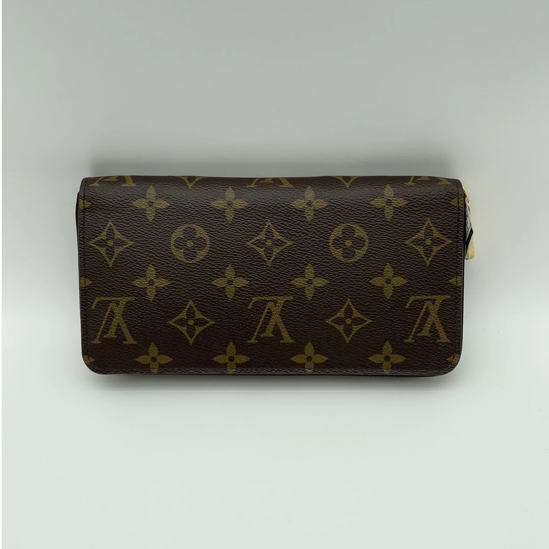 95新 LouisVuitton/路易威登 铭音97新/LV棕老花拉链款钱包/1412