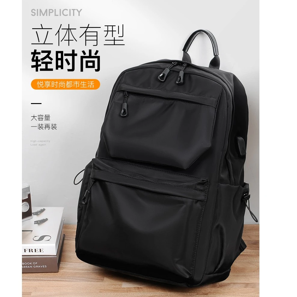 休闲双肩背包学生潮流百搭书包户外防水通勤电脑包纯色简约双肩包