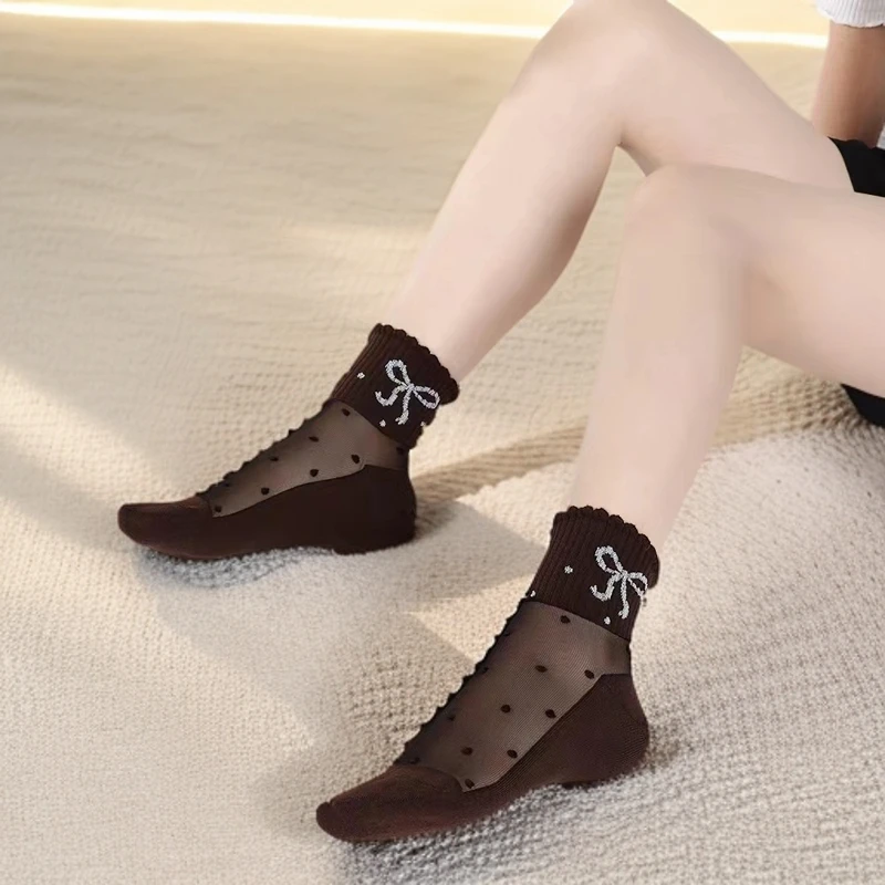 新款美拉德风格水晶丝袜秋季网红爆款棉底防滑女士丝袜蝴蝶结花型