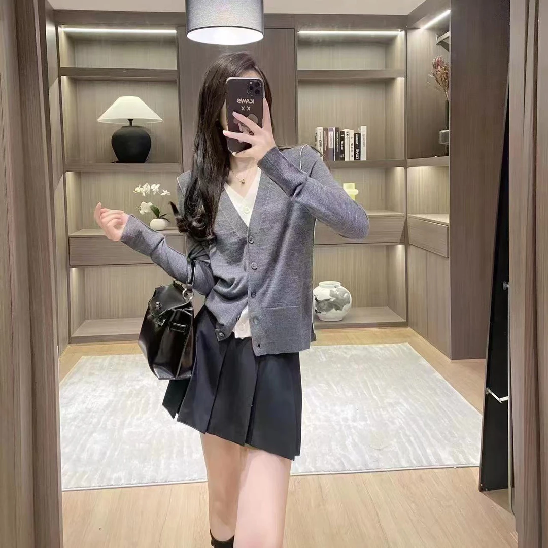 M1269 气质百搭假两件开衫薄款针织衫  衣长55 款号UF6842