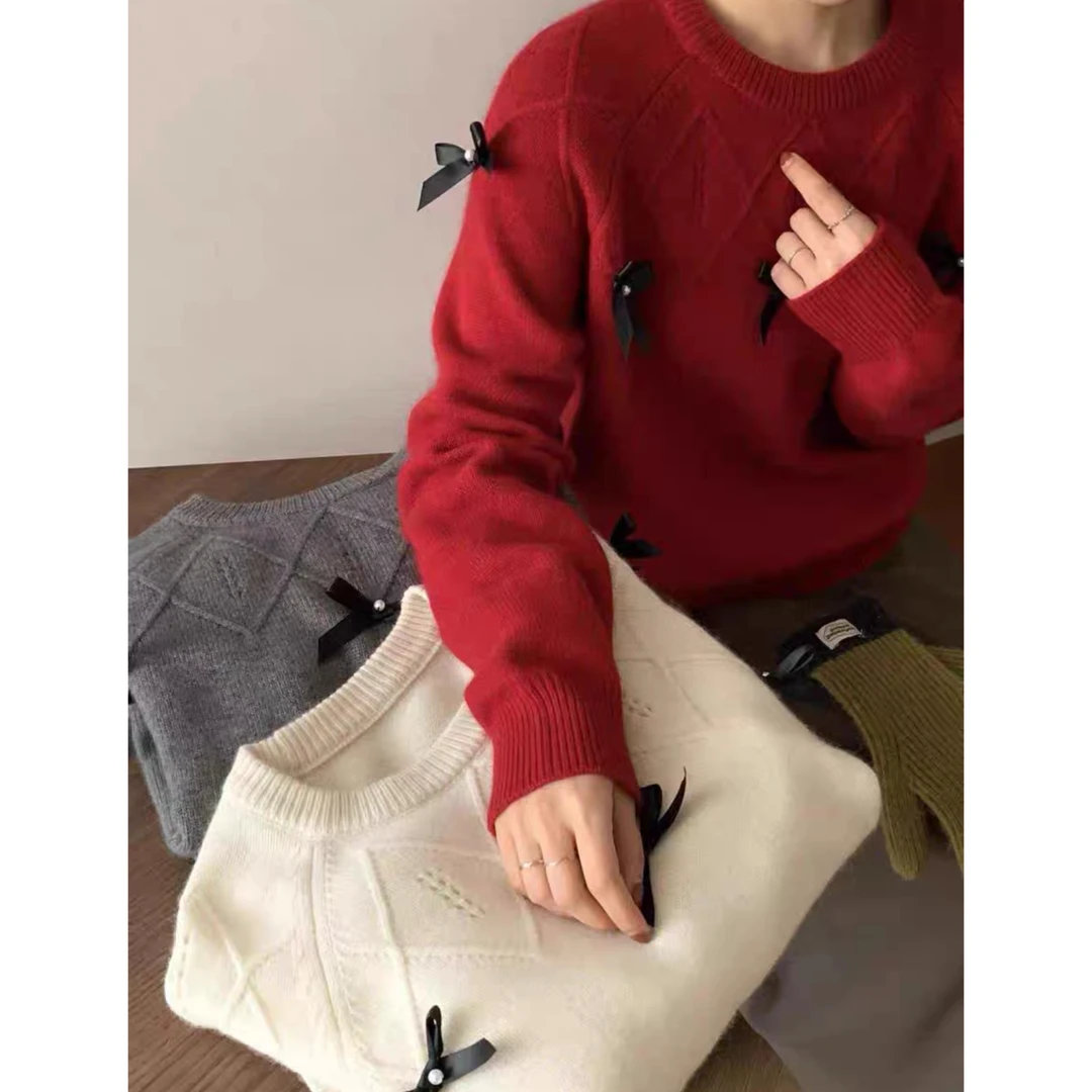 妮妮家冬季款休闲百搭纯色蝴蝶结长袖上衣5591