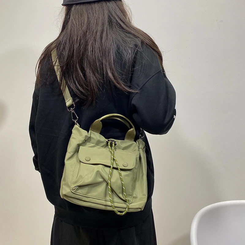 新款小众高质感水桶包韩版尼龙布小包时尚百搭休闲抽绳手提斜挎包