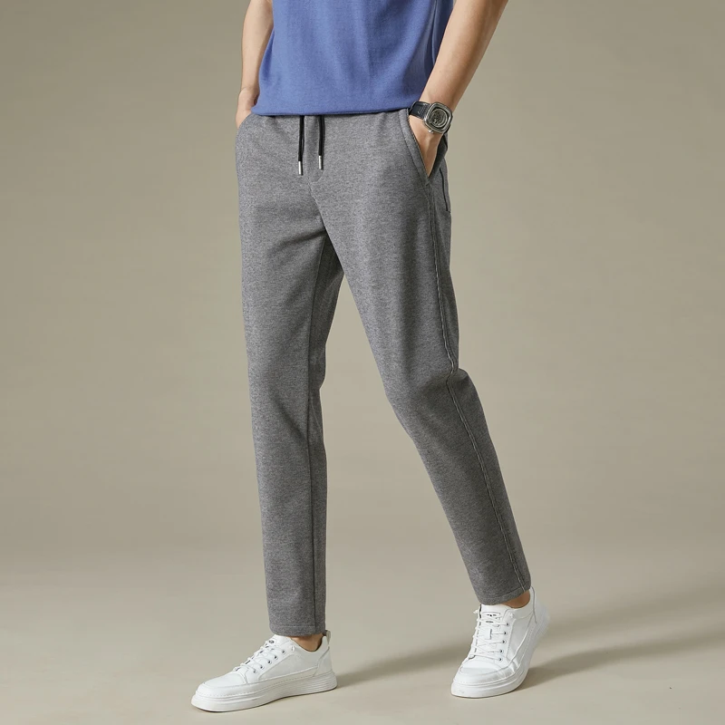 高端休闲裤男松紧腰抽绳长裤男士秋冬季加厚高弹力修身小脚男卫裤