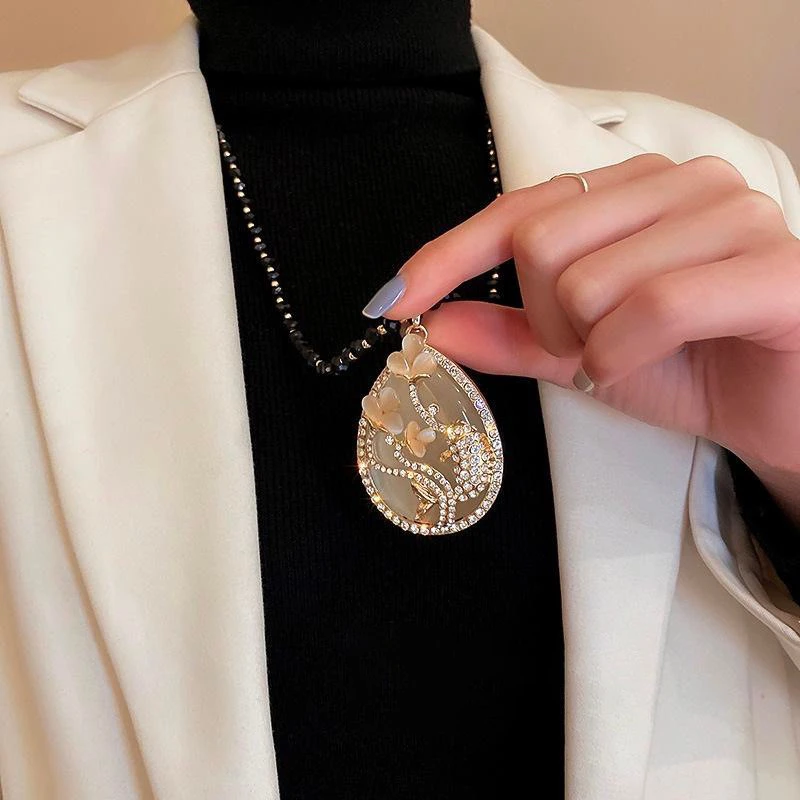 合金仿水晶项链 新款鱼花戏水项链长款毛衣链百搭秋冬女时尚吊坠