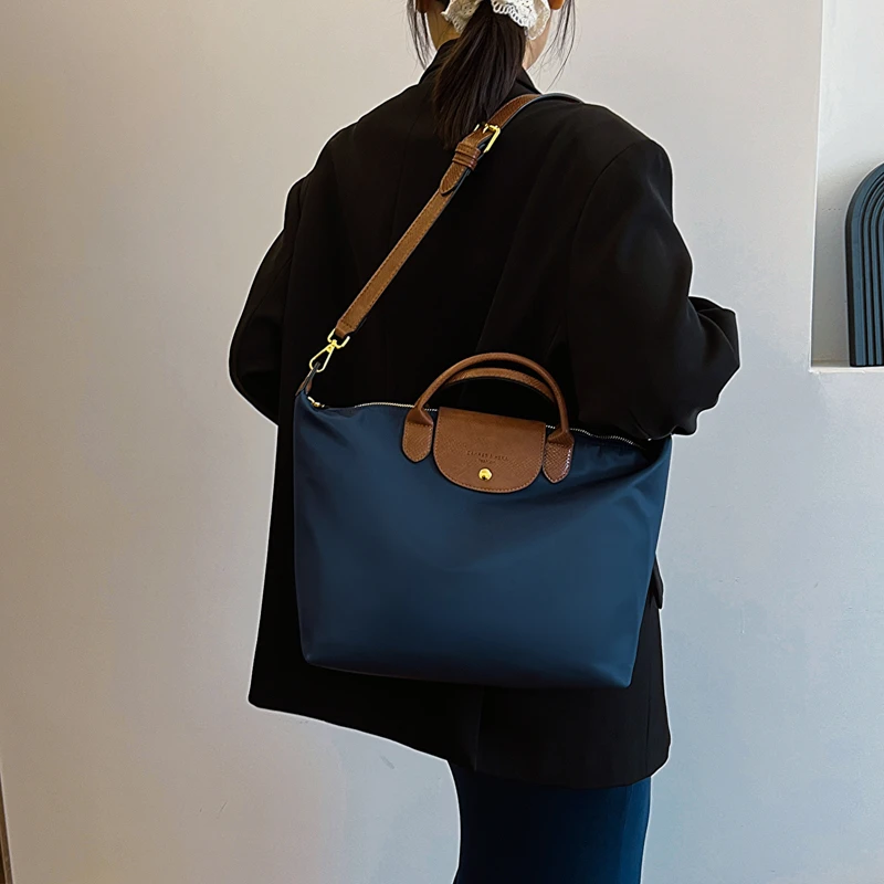 CH斜挎包2024新款时尚休闲背包手提包单肩包防水牛津布大包