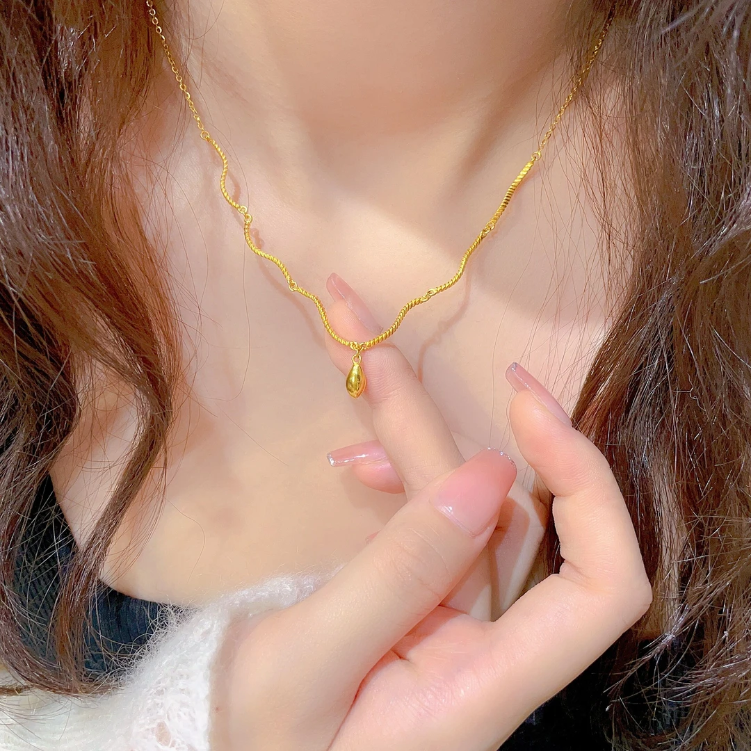 瑞诺黄金蛇骨水滴项链女2025新款999足金小众设计水滴吊坠锁骨链