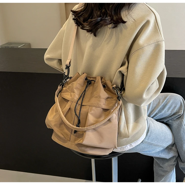 韩版时尚尼龙布抽绳水桶包个性百搭手提单肩斜挎包防水轻便5795