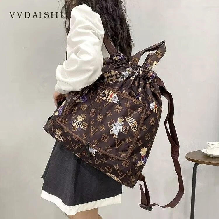 时尚休闲百搭印花双肩包女韩版多功能复古防水小众轻奢经典74