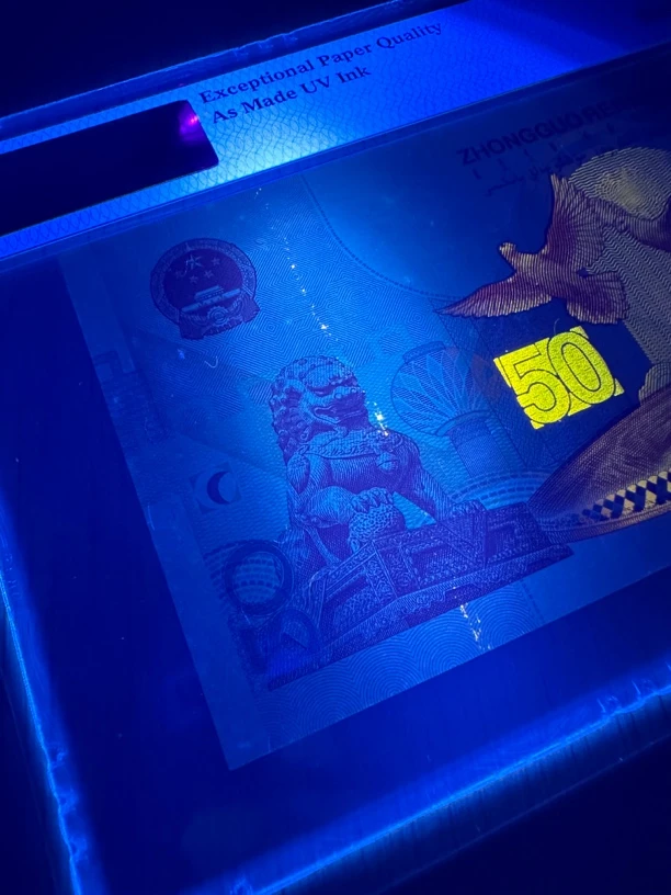 建国50周年纪念钞金瀑布版荧光PMG66（号码带4）带UV Ink标注