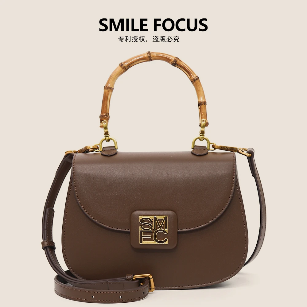 微笑有约2024潮款包包女士休闲通勤风竹节手提包