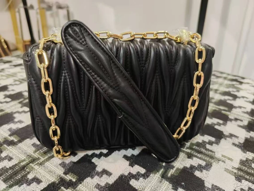 时尚女士复古编织牛皮单肩手拎包肩包