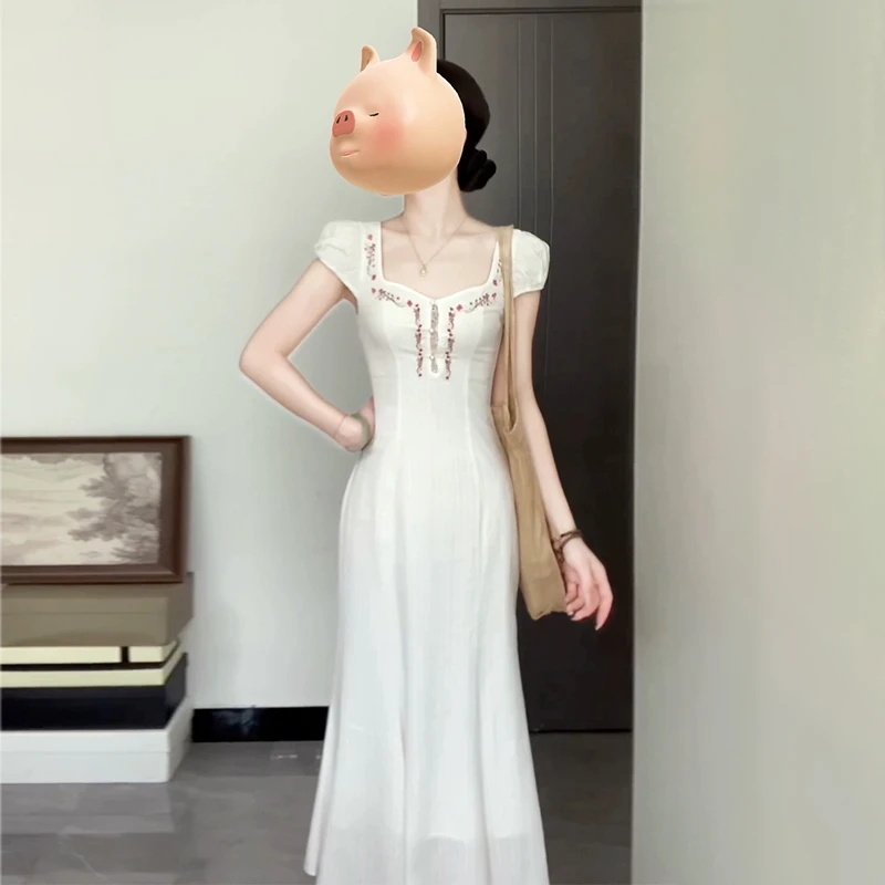 2024新款女装女装气质白色夏季复古法式小众鱼尾连衣裙4199