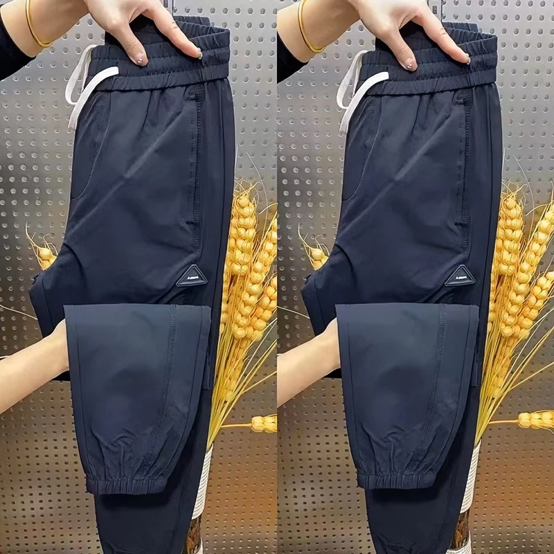 夏季薄款冰丝裤男士透气休闲裤宽松男款潮流时尚运动束脚卫裤百搭