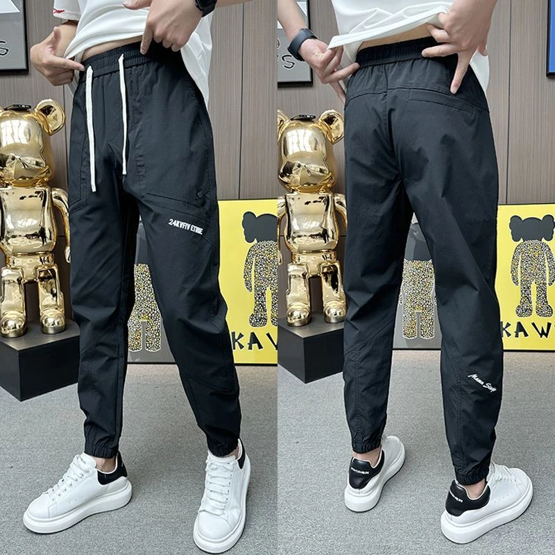 2025夏季薄款透气休闲裤时尚男士百搭潮流冰丝裤宽松拼接束脚裤