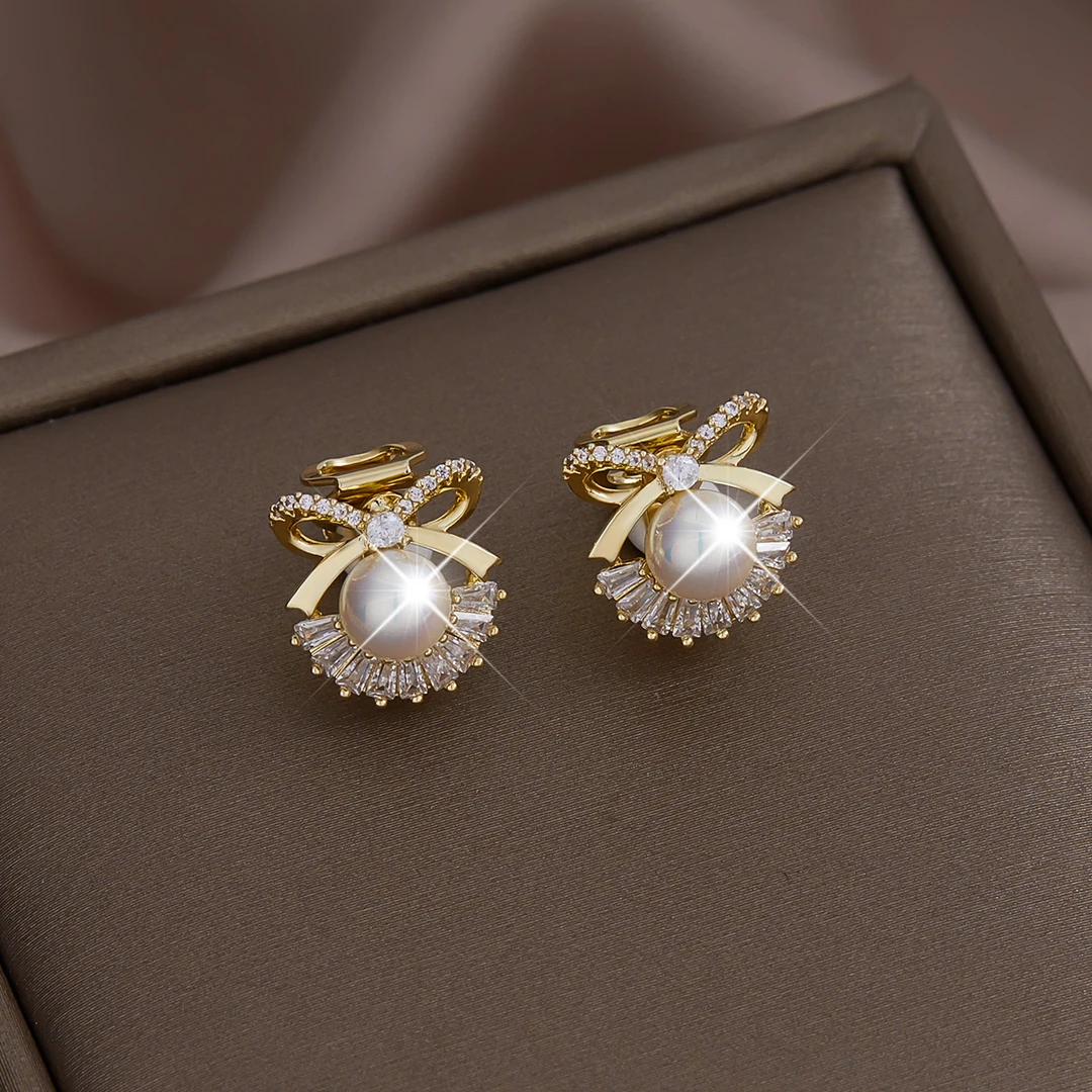 mck 合金仿珍珠耳饰 高级感蝴蝶结耳夹2023年新款无耳洞女款耳饰