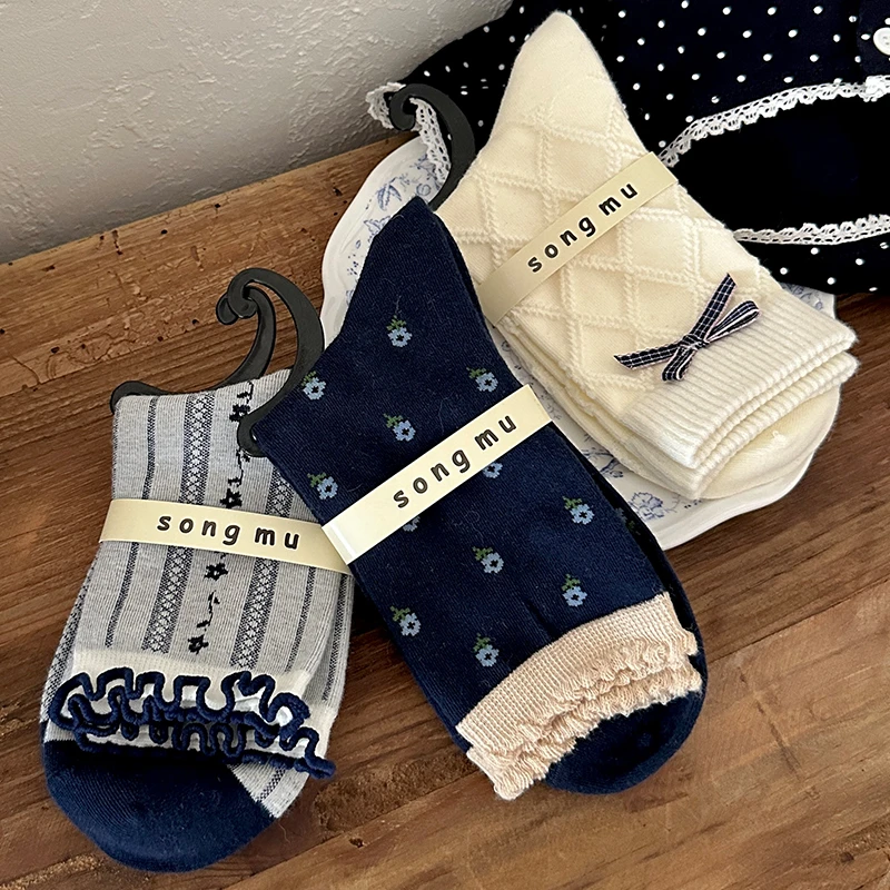 甜美森系碎花棉袜蓝色蝴蝶结袜子女中筒袜日系可爱木耳花边堆堆袜