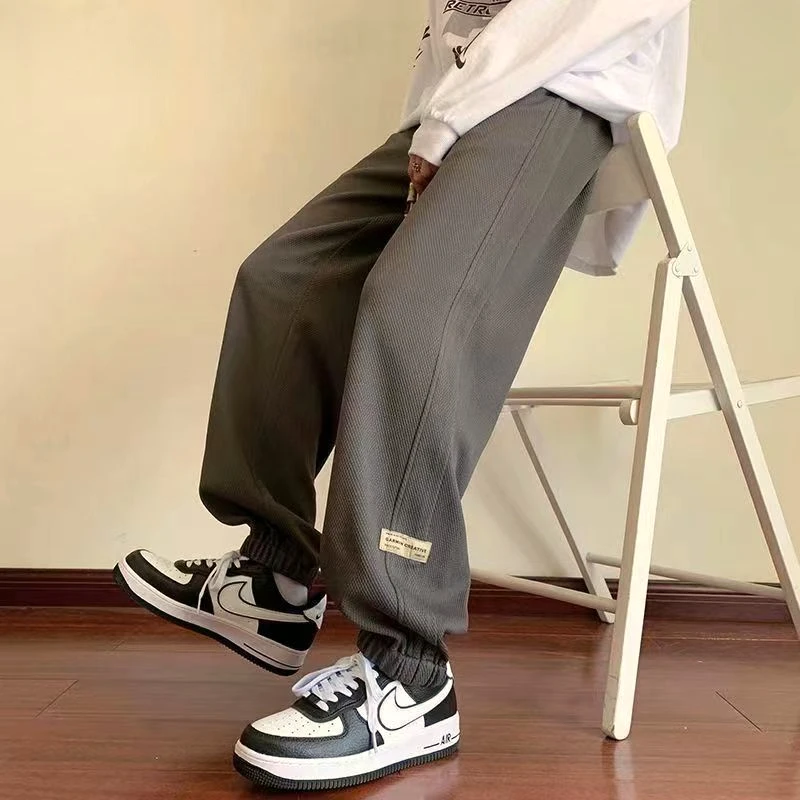 大码胖mm加绒宽松束脚卫裤女款爆款2024新款秋冬高腰休闲运动裤子