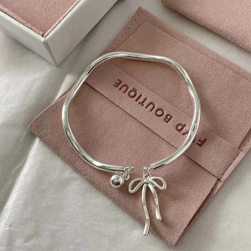 足银手镯 足银9999手镯开口波浪流苏蝴蝶结铃铛银手镯轻奢气质ins