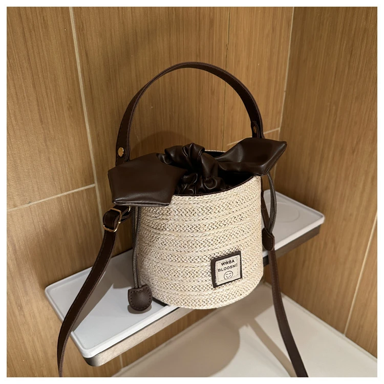 编织草编包女2025新款手提水桶包小包包女士高级质感小众斜挎包