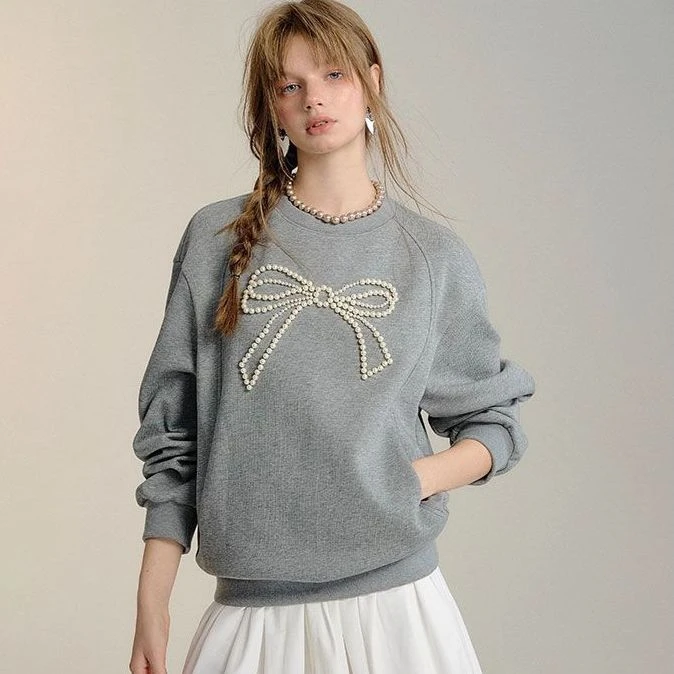 极简风休闲蝴蝶结钉珠套头卫衣女2024秋季新款通勤宽松上衣百搭