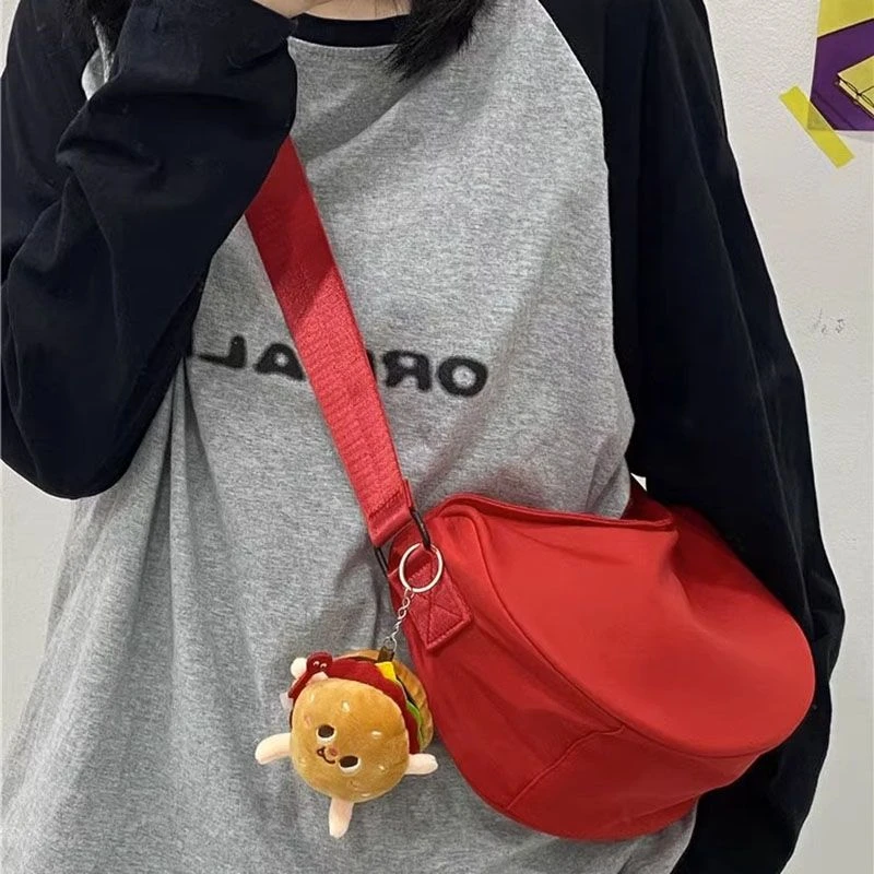 休闲流行小包女2024新款潮红色斜挎包女休闲运动单肩包百搭饺子包