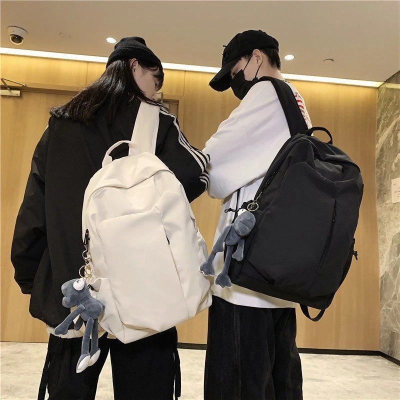 2024休闲韩版双肩包女大学生简约潮流情侣书包电脑背包男潮