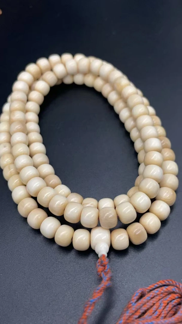 61189精品猛犸牙卡7老型脖挂（有色差）