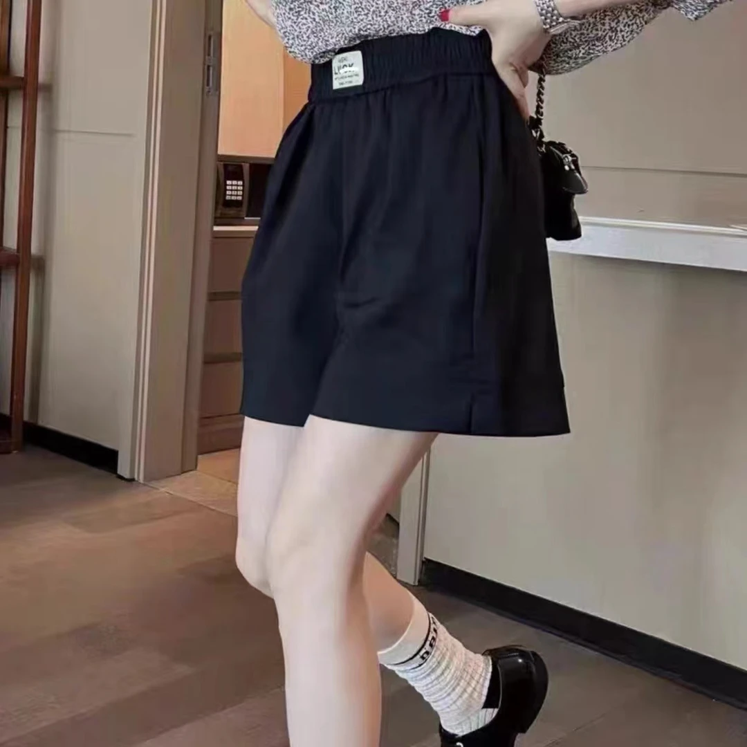 欣娜美 韩版松紧腰贴标纯色时尚休闲百搭显瘦夏季气质短裤五分裤