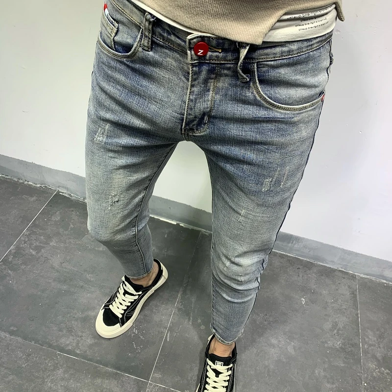 新款流行男士牛仔裤韩版潮流水洗浅蓝修身小脚弹力百搭九分长裤子