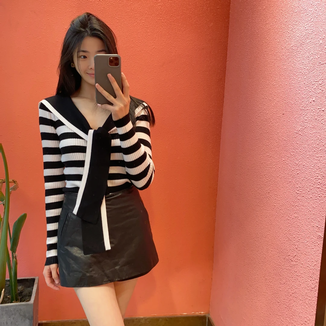 （默茗服装）A字版超薄小皮裙裤