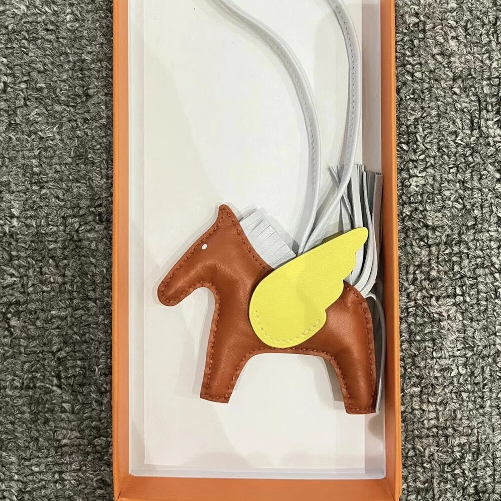 95新 Hermes/爱马仕 棕色拼黄色翅膀拼雾霾蓝马尾小飞马