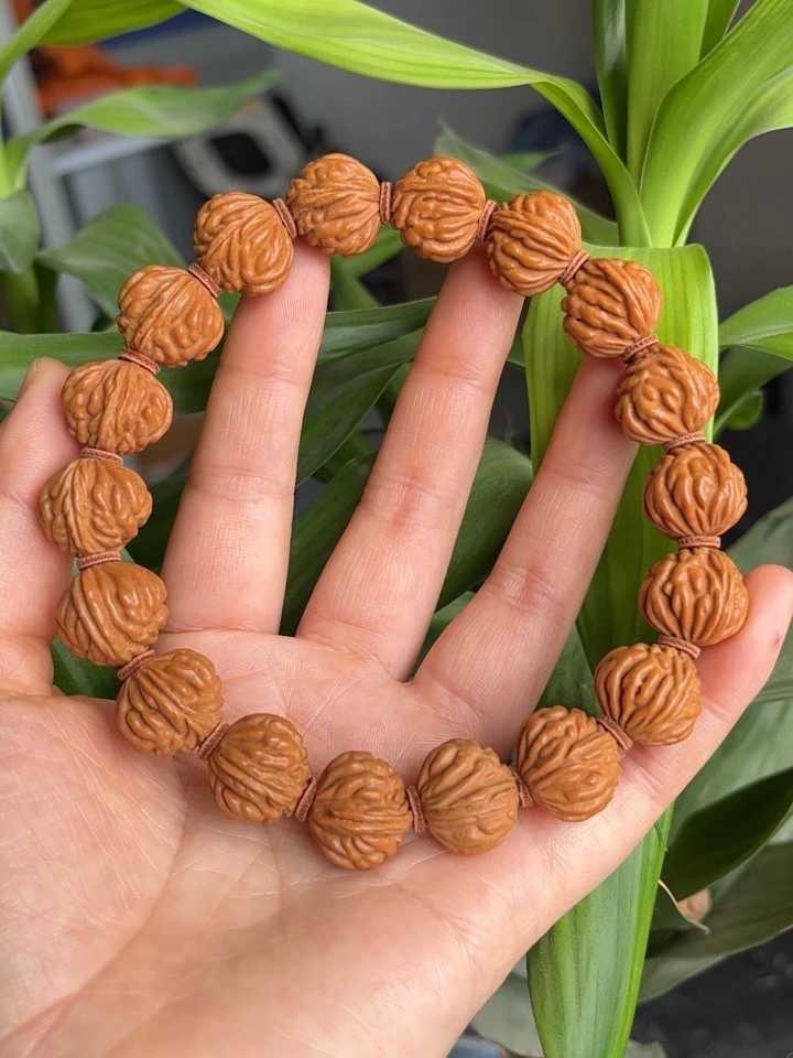 专拍链接秦岭野生龙纹桃核手持，手串