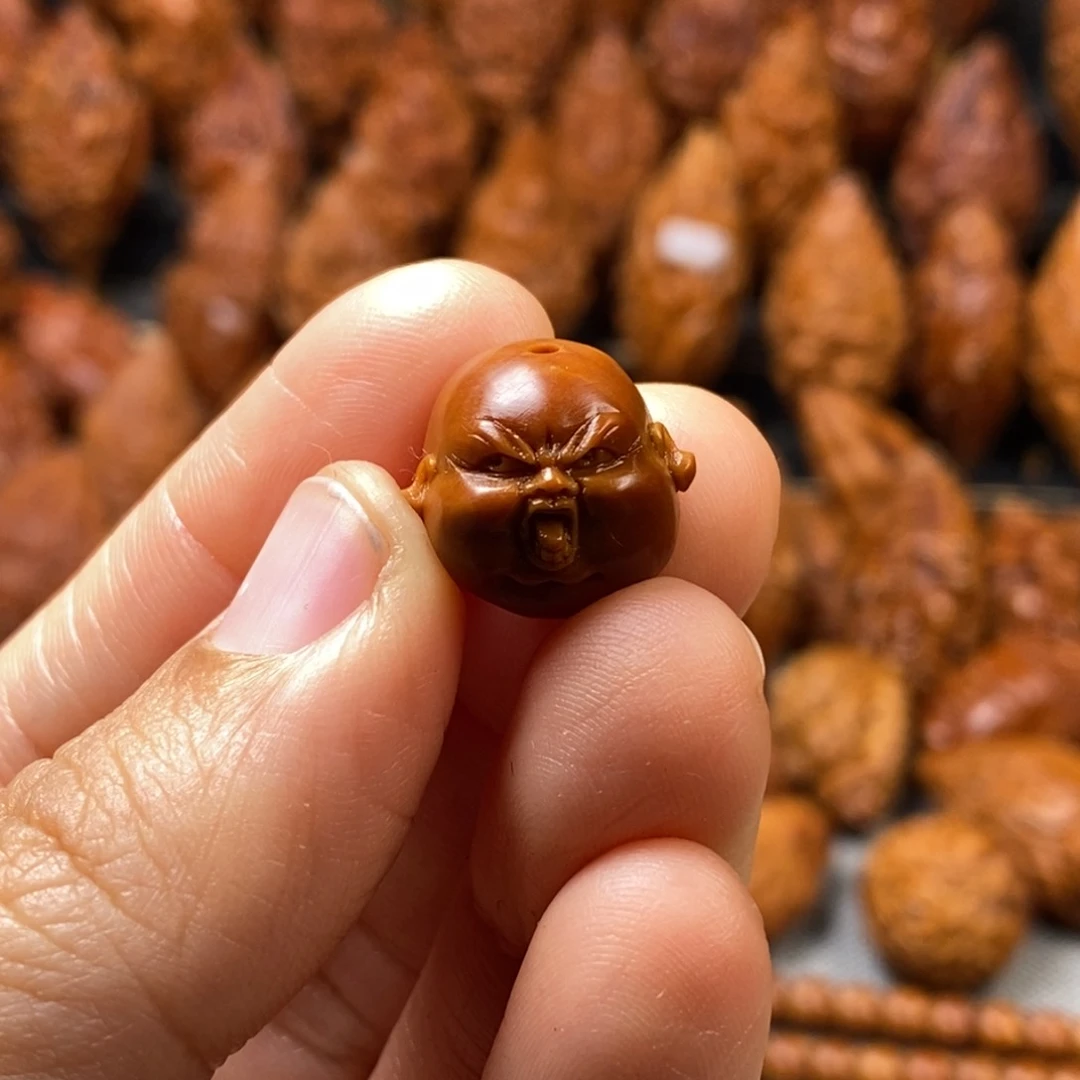 橄榄核核雕x****o核雕单子