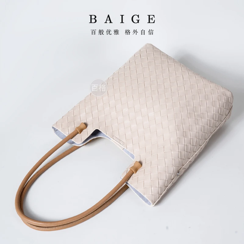 2024新款真皮女士休闲时尚百搭通勤大容量编织包托特肩包2469