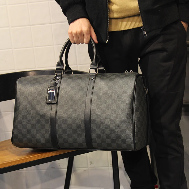 新款真皮大容量旅行包男款手提男士大容量短途出差行李牛皮斜跨包