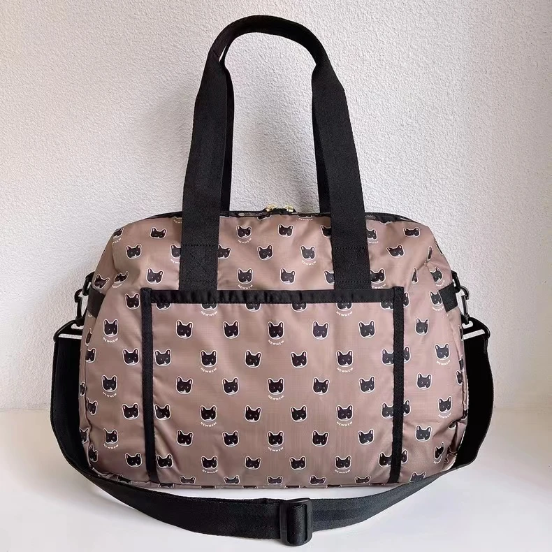 XA489 女布包猫咪联名系列可爱3807牛牛世界带挂件