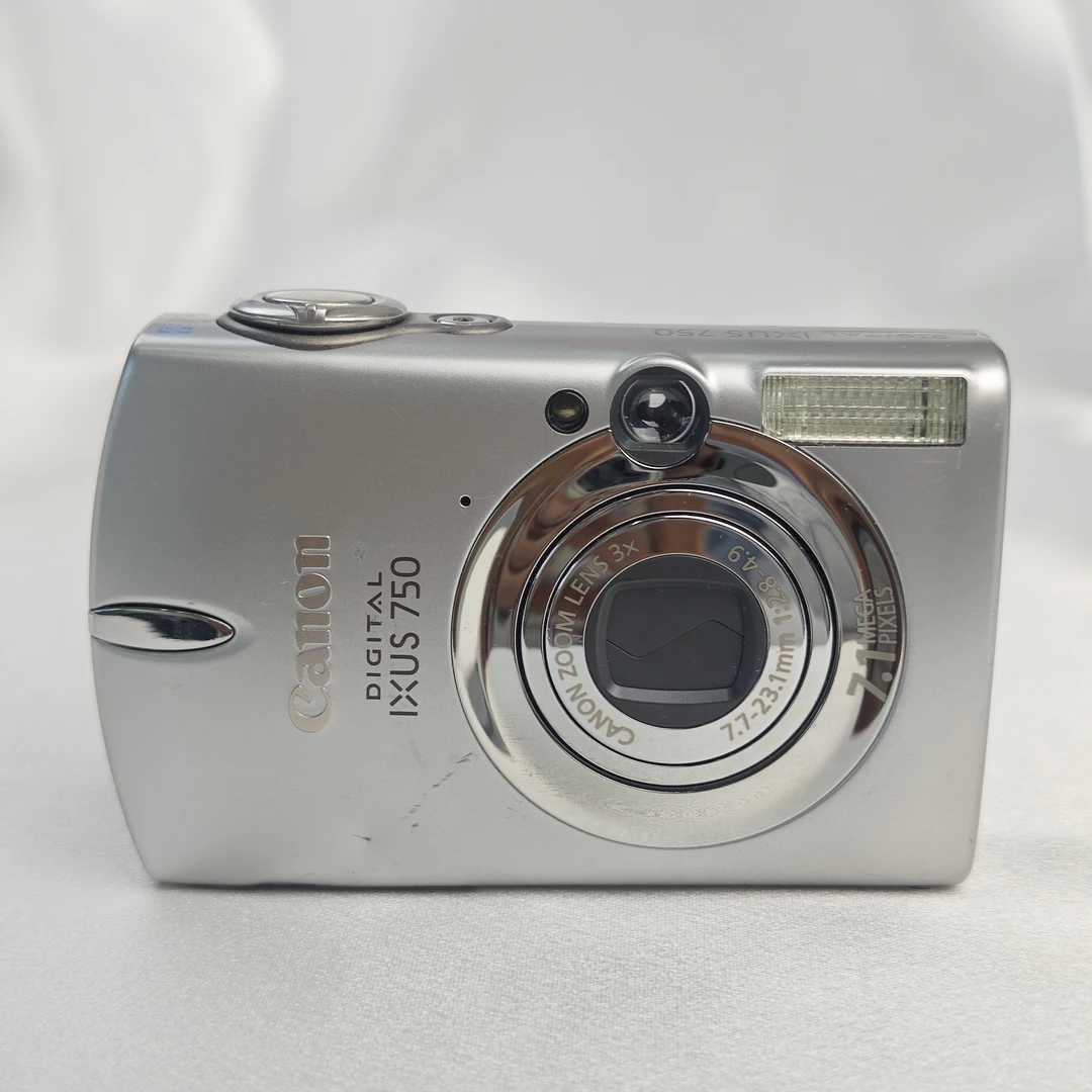 9新 Canon/佳能 ixus750银色710万像素3倍变焦ccd数码相机
