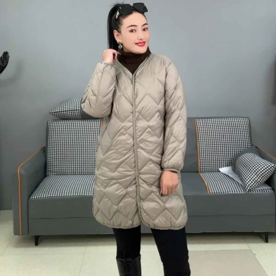 【酷时典】的不挑年龄的轻薄藏装上面穿也特别好看的冬装外套