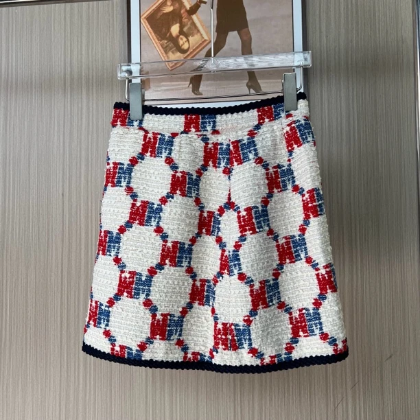 092品牌撤柜女装曼家时尚设计款小香风短裙