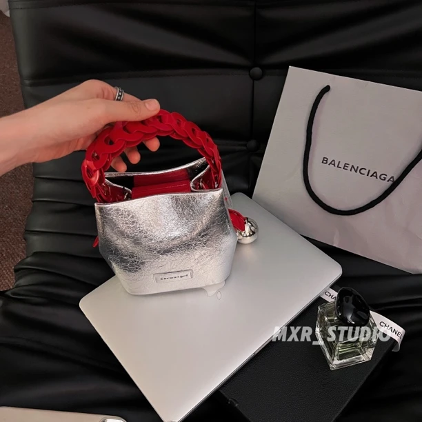 【沿海公路】银色包包女小巧精致编织手提包质感小众斜挎包水桶包