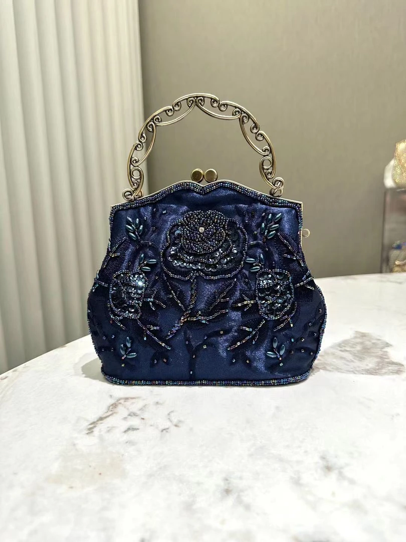 蓝色轻奢时尚女士黑色紫色压花手拿包复古重工晚宴包