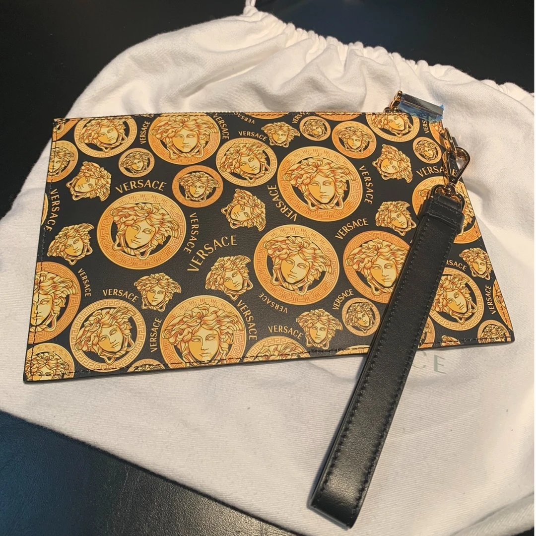99新 VERSACE/范思哲 范思哲手拿包/P109/ 赠钥匙扣
